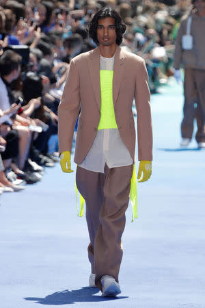 A model presents a creation by designer Virgil Abloh as part of his Spring/Summer 2019 collection for Louis Vuitton fashion house during Men's Fashion Week in Paris, France, June 21, 2018. REUTERS/Charles Platiau