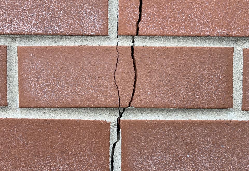 Close-up detail of crack in brick facade on west side of Anthony Wayne Middle School on Garside Avenue.