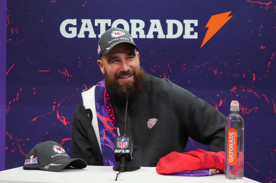 Travis Kelce answers questions during Super Bowl Opening Night at Allegiant Stadium.