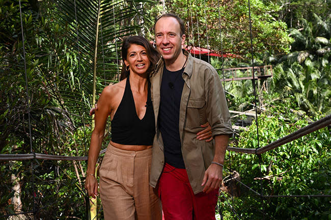 matt and gina pose on bridge after jungle exit