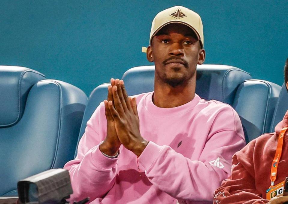 Miami Heat’s Jimmy Butler watches the match between Carlos Alcaraz of Spain and Grigor Dimitrov of Bulgaria during the Miami Open Tennis Tournament at Hard Rock Stadium in Miami Gardens, Florida on Thursday, March 28, 2024. Al Diaz/adiaz@miamiherald.com