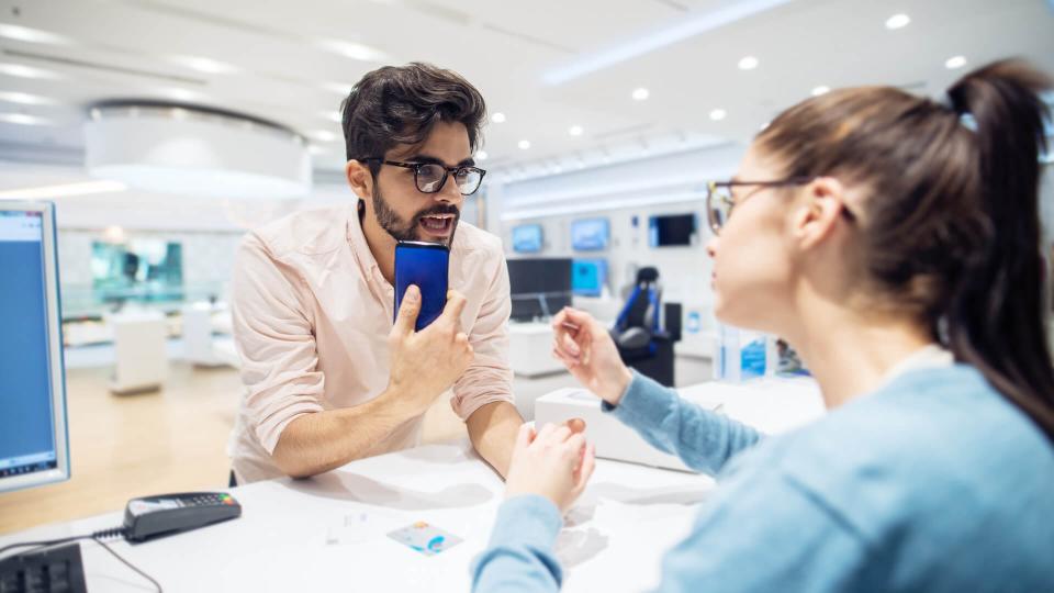 man asking customer service rain check