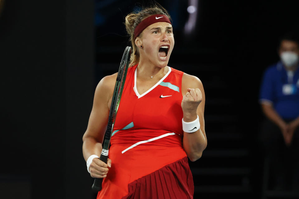 Aryna Sabalenka of Belarus reacts after winning the second set against Storm Sanders of Australia during their first round match at the Australian Open tennis championships in Melbourne, Australia, Tuesday, Jan. 18, 2022. (AP Photo/Hamish Blair)