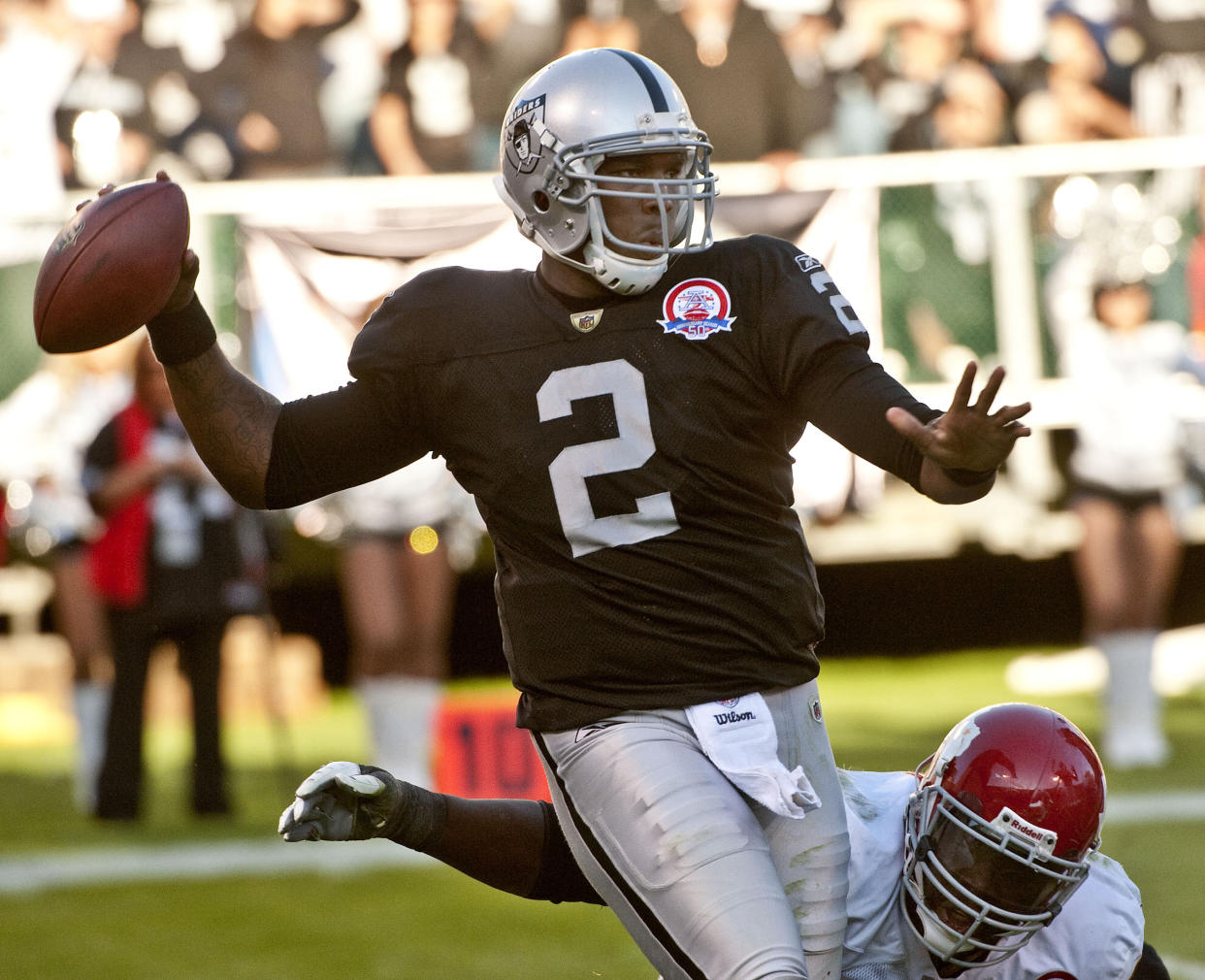 November 15, 2009: Oakland Raiders quarterback JaMarcus Russell #2 passes while Kansas City Chiefs defensive end Andy Studebaker #96 is about to sack him on Sunday, November 15, 2009 at Alameda County Coliseum in Oakland, California. The Chiefs defeated the Raiders 16-10. (Photo by Al Golub/Icon Sportswire/Corbis/Icon Sportswire via Getty Images)