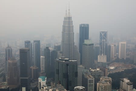 A view of the city skyline shrouded by haze in Kuala Lumpur