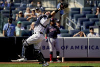 New York Yankees' Gary Sanchez misses a pop fly by Cleveland Indians' Oscar Mercado off starting pitcher Luis Gil in the fifth inning of a baseball game, Saturday, Sept. 18, 2021, in New York. (AP Photo/John Minchillo)