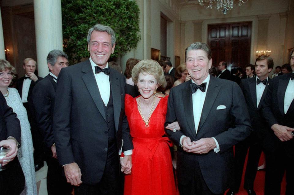 Rock Hudson with Nancy Reagan and President Ronald Reagan at a state dinner in 1984, one year before the actor died of AIDS. (Photo: Everett Collection)