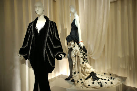 A creation (front), from Autumn-Winter 1983 collection, is displayed at the Yves Saint Laurent Museum in Paris, France, September 27, 2017. The new museum, celebrating the life and work of French designer Yves Saint Laurent (1936-2008), will open at the avenue Marceau address of his former work studio for almost 30 years. Picture taken September 27, 2017. REUTERS/Stephane Mahe