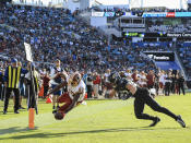 <p>Jeremy Sprinkle #87 of the Washington Redskins dives for a touchdown while Nick DeLuca #57 of the Jacksonville Jaguars attempts to stop him during the second half at TIAA Bank Field on December 16, 2018 in Jacksonville, Florida. (Photo by Sam Greenwood/Getty Images) </p>