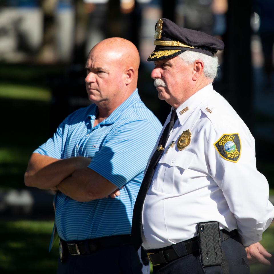 Quincy Police Chief Paul Keenan, right, on Hancock-Adams Common.