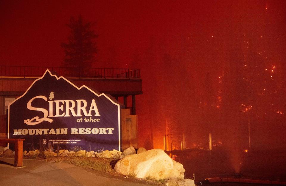 Flames surround the Sierra-at-Tahoe Resort during the Caldor fire in Twin Bridges, California on August 30, 2021.
