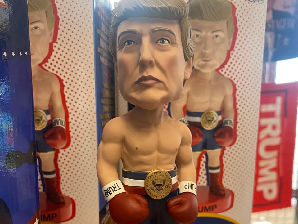 Donald Trump miniature with boxing gloves.