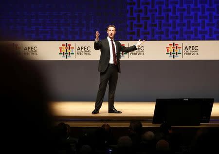 Facebook founder Mark Zuckerberg gestures while addressing the audience during a meeting of the APEC (Asia-Pacific Economic Cooperation) Ceo Summit in Lima, Peru, November 19, 2016. REUTERS/Mariana Bazo