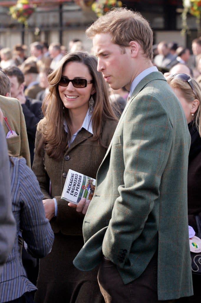 The Prince and Princess of Wales greeting friends at the Cheltenham Horse Racing Festival on March 13, 2007. Getty Images