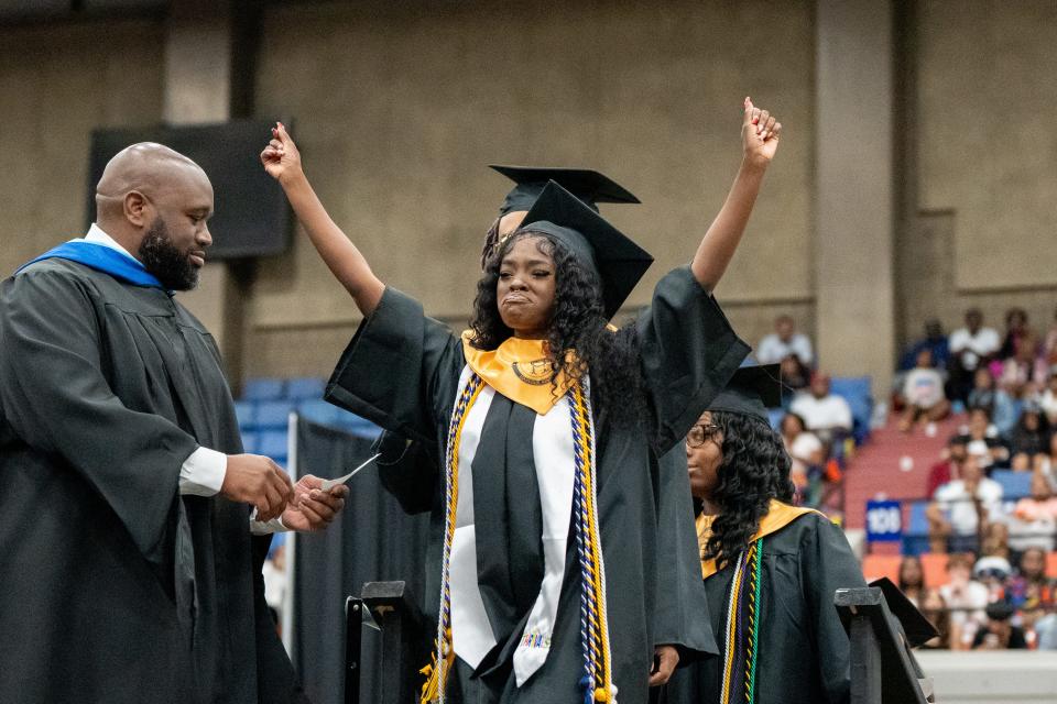 Central High School graduates walk the stage to receive their diplomas from Principal Dr. Tamela Compton during their graduation ceremony on Saturday, May 25, 2024.