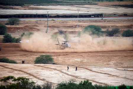 A helicopter takes off as it transports Israeli Prime Minister Benjamin Netanyahu following a weekly cabinet meeting in the Jordan Valley, in the Israeli-occupied West Bank