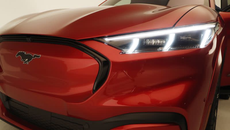 This Wednesday, Oct. 30, 2019 photo shows the front headlights of the new Ford Mustang Mach-E SUV in Warren, Mich. Headlights are brighter now than they used to be due to the change in style and technology used to create them.