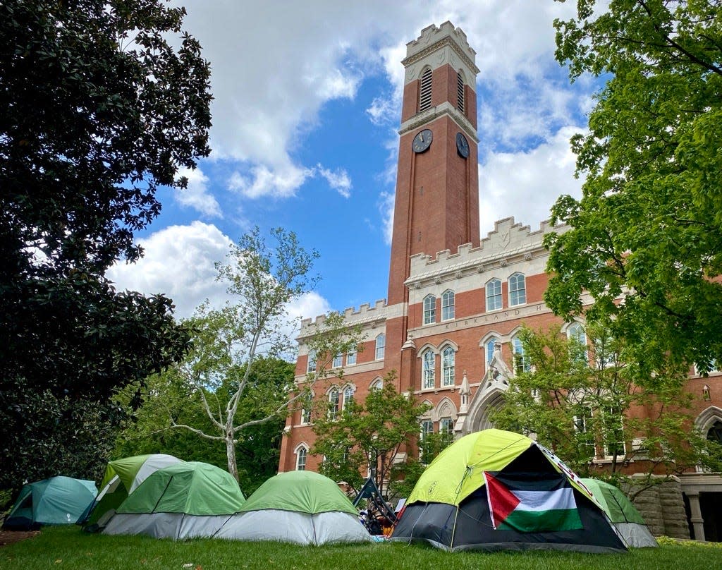 Student tents line the lawn in front of Kirkland Hall, an administrative building at Vanderbilt University, where students have been protesting for over a month.