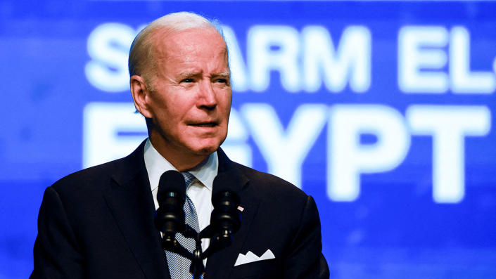 President Biden at the microphone with Sharm El Sheikh, Egypt, in bold letters behind him.