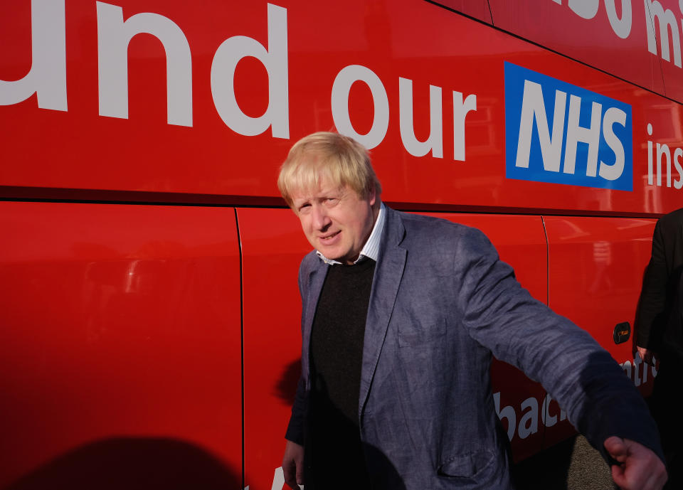 CHESTER-LE-STREET, ENGLAND - MAY 30: Boris Johnson MP walks past the battle bus during a visit Chester-Le-Street Cricket Club as part of the Brexit tour on May 30, 2016 in Chester-Le-Street, England. Boris Johnson and the Vote Leave campaign are touring the UK in their Brexit Battle Bus on a campaign hoping to persuade voters to back leaving the European Union in the June 23rd referendum. (Photo by Ian Forsyth/Getty Images)