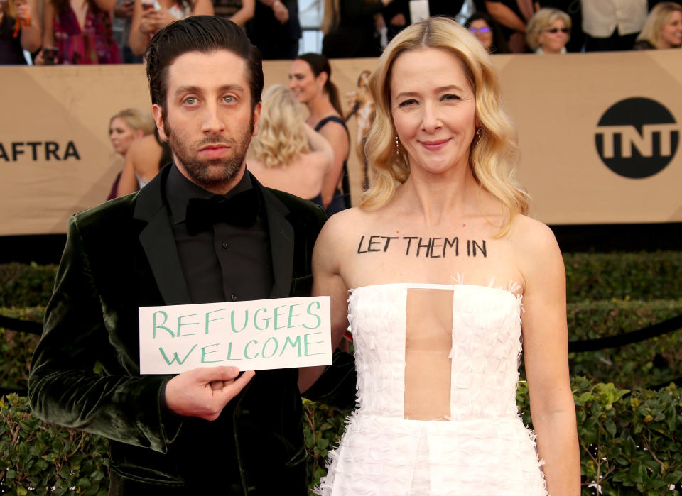 Simon Helberg and Jocelyn Towne brought a sign to the 23rd annual Screen Actors Guild Awards.