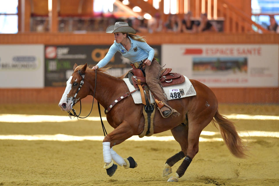 GIVRINS, SWITZERLAND - AUGUST 12:  Gina Schumacher of Germany rides on her horse Arc Guns M Oaks during the SVAG FEI European Championship Reining Young riders 2016 at the CS Ranch on August 12, 2016 in Givrins, Switzerland.  (Photo by Harold Cunningham/Getty Images)