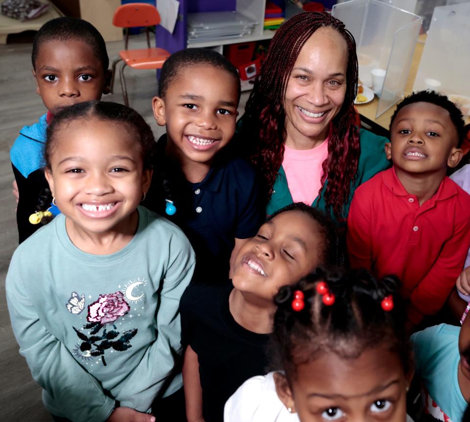 Yolanda Williams, owner of Dee's Little Angels Child Care Center in Detroit, with some of the kids she is in charge of before their lunchtime on Thursday, April 20, 2023. Child care providers have been frustrated by the delay in DHHS notifications when children who receive subsidies through the state's child care subsidy program get their hours reduced or canceled.