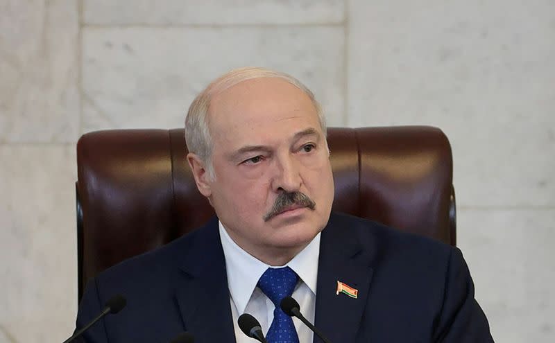 FILE PHOTO: Belarusian President Alexander Lukashenko delivers a speech in Minsk