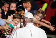 Pope Francis arrives to visit the Basilica of Saint Bartholomew on the Tiber island in Rome, April 22, 2017. REUTERS/Alessandro Bianchi