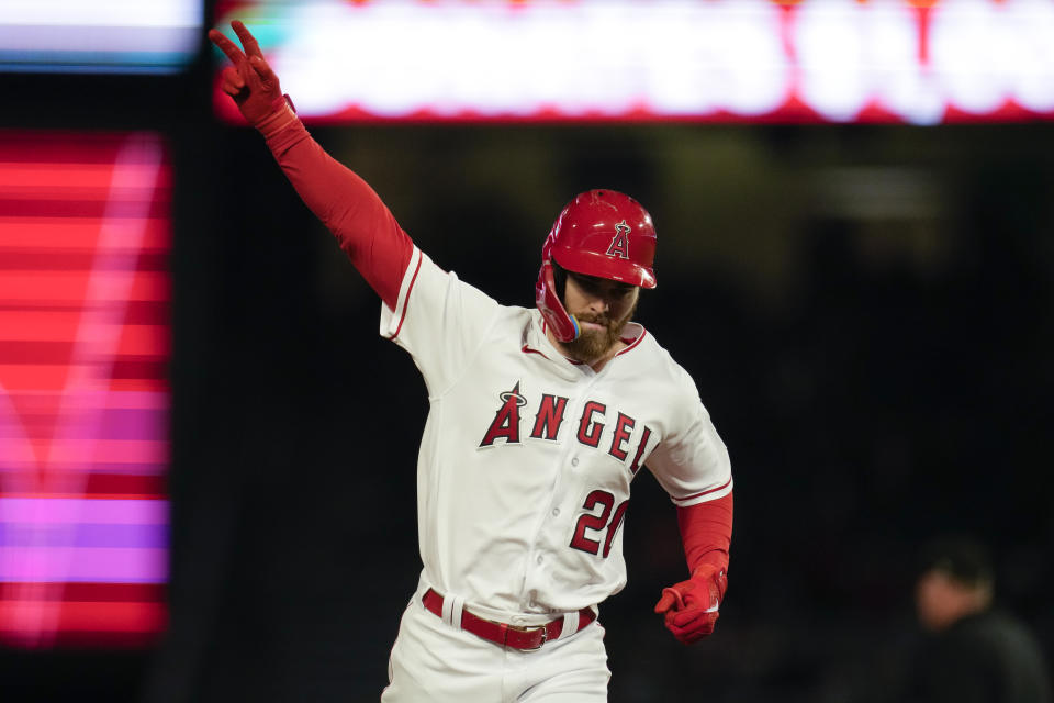 Los Angeles Angels' Jared Walsh runs the bases after hitting a home run during the ninth inning of a baseball game against the Detroit Tigers in Anaheim, Calif., Saturday, Sept. 16, 2023. Logan O'Hoppe also scored. (AP Photo/Ashley Landis)