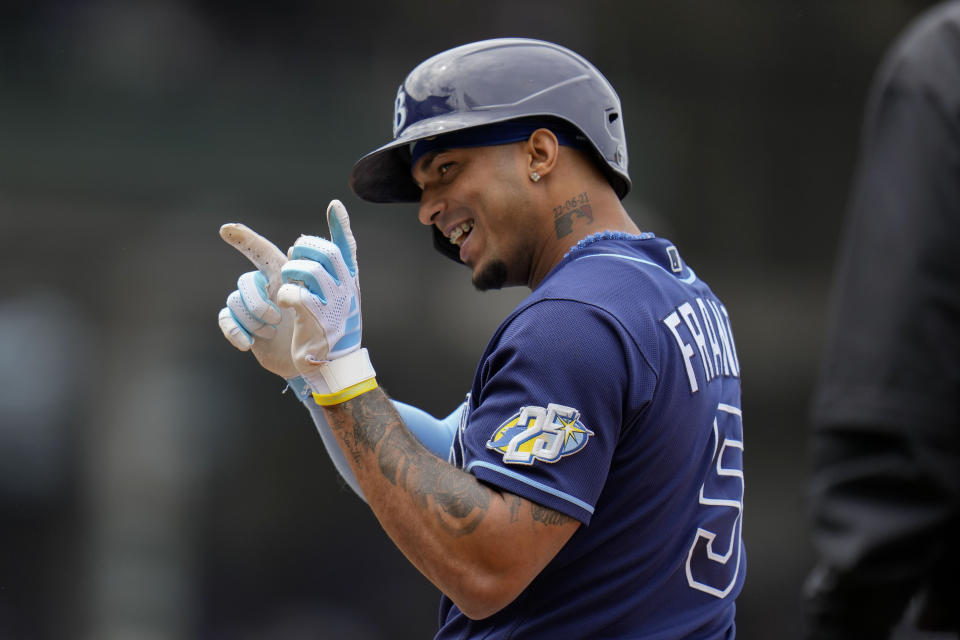 Tampa Bay Rays' Wander Franco points at his dugout after hitting a single during the seventh inning of a baseball game against the Chicago Cubs, Monday, May 29, 2023, in Chicago. (AP Photo/Erin Hooley)