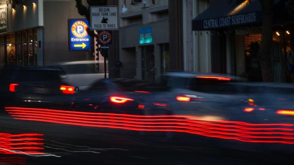 Traffic lines up to enter the Marsh Street parking structure in San Luis Obispo in this 2-second time exposure on Oct. 26, 2023.