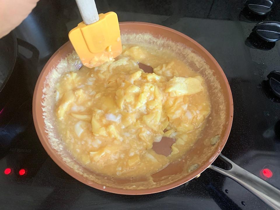 Scrambling eggs for Ina Garten's breakfast tacos