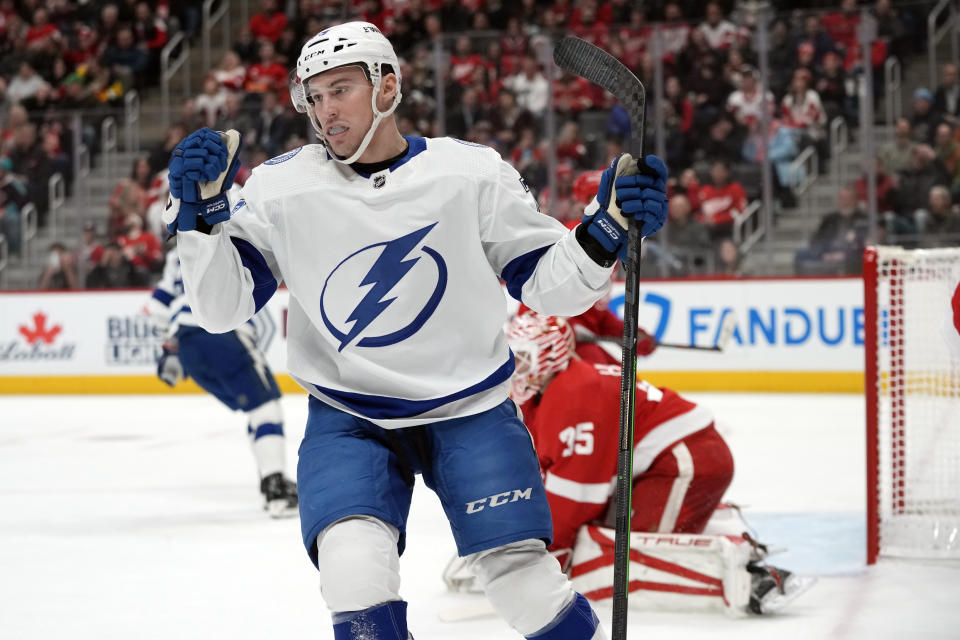 Tampa Bay Lightning center Ross Colton reacts after scoring on Detroit Red Wings goaltender Ville Husso during the second period of an NHL hockey game, Wednesday, Dec. 21, 2022, in Detroit. (AP Photo/Carlos Osorio)