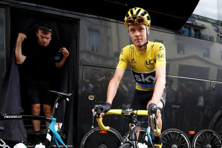 Cycling - Tour de France cycling race - The 162.5 km (101 miles) Stage 11 from Carcassone to Montpellier, France - 13/07/2016 - Yellow jersey leader, Team Sky rider Chris Froome of Britain, prepares for the start near team bus. REUTERS/Juan Medina