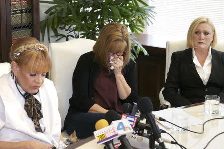 (L-R) Autumn Burns, Janice Baker Kinney, and Marcella Tate attend a news conference announcing more allegations against comedian Bill Cosby in Los Angeles, California April 23, 2015. REUTERS/Jonathan Alcorn