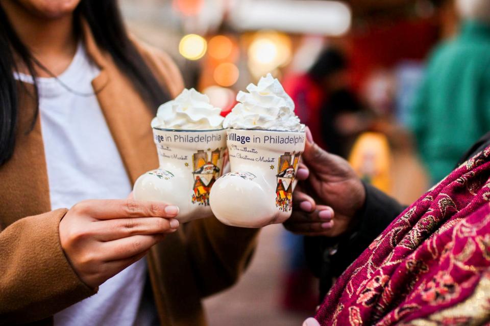 Warm with hot cocoas in festive mugs.