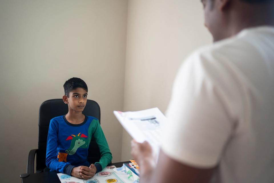 Avinav Prem Anand is quizzed by his father, Prem Anand Rathinasabapathy, in preparation for this week's Scripps National Spelling Bee.