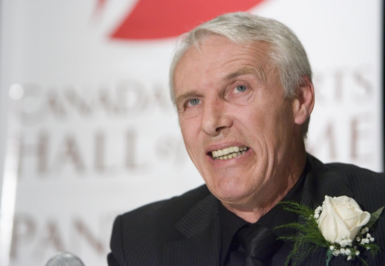 FILE - Canada's Sports Hall of Fame inductee and former hockey great Mike Bossy, smiles during a news conference in Toronto, Thursday Oct. 25, 2007. Bossy, one of hockey’s most prolific goal-scorers and a star for the New York Islanders during their 1980s dynasty, died Thursday, April 14, 2022, after a battle with lung cancer. He was 65. (AP Photo/Frank Gunn, The Canadian Press, File)