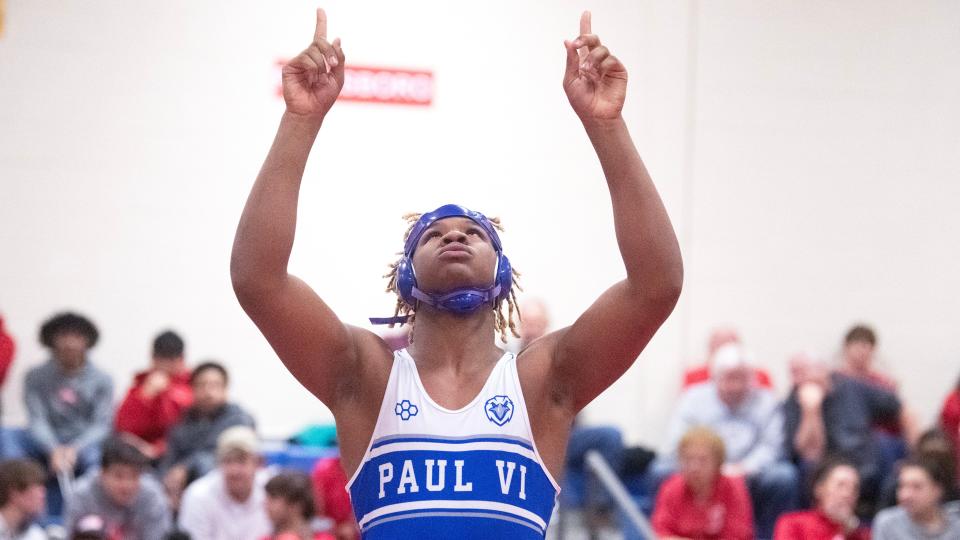 Paul VI's Anthony Jackson celebrates after pinning Haddon Township's Chris Broderick during the 215 lb. bout of the championship round of the District 28 wrestling tournament held at the Rowan College of South Jersey in Deptford on Saturday, February 17, 2024.