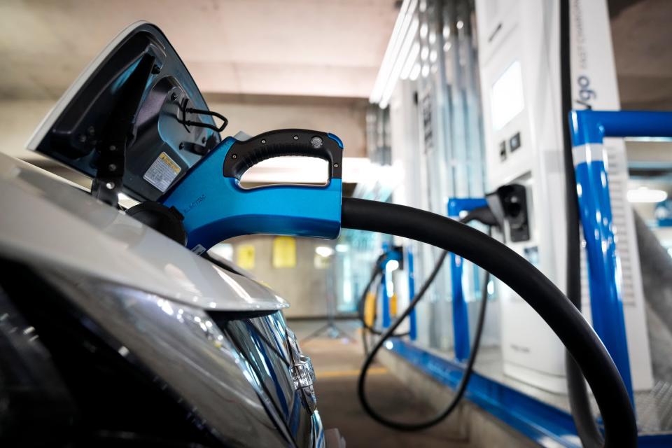 Electric vehicles are displayed before a news conference with White House Climate Adviser Gina McCarthy and U.S. Secretary of Transportation Pete Buttigieg on April 22, 2021 in Washington, DC.