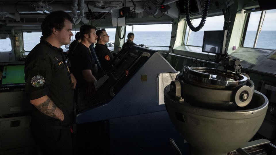 (L-R) Lieutenant(Navy) Jacob Broderick, Sub-Lieutenant Ben Hughes, Naval Warfare Officers, and Commander Sam Patchell, Commanding Officer of HMCS Ottawa, perform their duties on the bridge of the ship as it conducts a transit through the Taiwan Strait during Indo-Pacific Deployment on 2 November 2023.
*Image has been digitally altered for operational security* - Aviator Gregory Cole/Canadian Armed Forces Photo