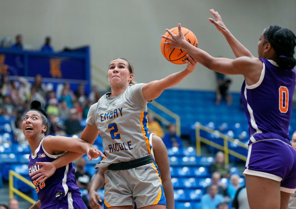Embry-Riddle's Mary Lengemann (2) goes for the rebound as the Eagles took down Edward Waters at Embry-Riddle Aeronautical University in Daytona Beach, Friday, Dec.15, 2023.