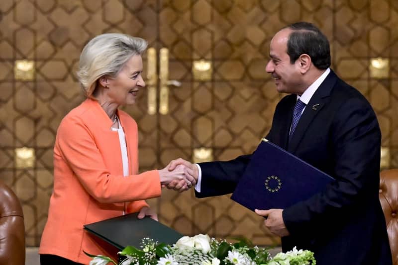 European Commission president Ursula Von der Leyen and Egypt president Abdel Fattah el-Sisi shake hands after signing documents during Egyptian- European summit. The European Commission, in a statement made in Cairo on Sunday 17 March revealed plans to provide financial aid to Egypt through a combination of loans and grants totalling €7.4 billion ($8.1 billion) until the end of 2027. Dirk Waem/Belga/dpa