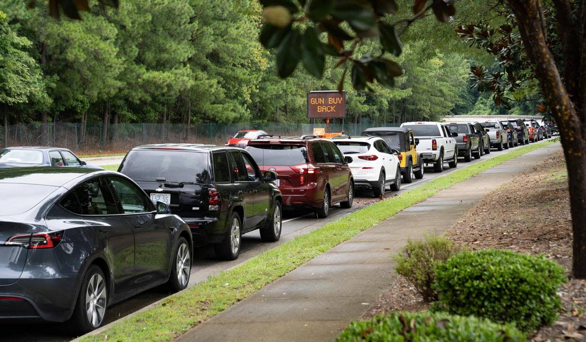 Hundreds of cars were in attendance and stretched around the entire block at the Raleigh gun buy back event at Mount Peace Baptist Church on Saturday, Aug. 20, 2022.