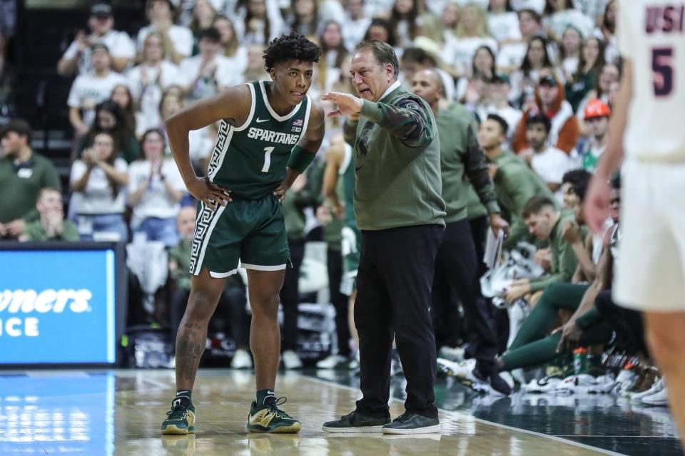 Michigan State head coach Tom Izzo talks to guard Jeremy Fears Jr. (1) during the first half against Southern Indiana at Breslin Center in East Lansing on Thursday, Nov. 9, 2023.