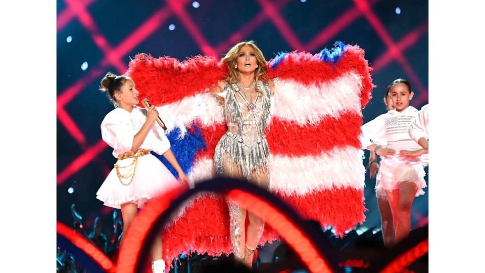 MIAMI, FLORIDA - FEBRUARY 02:  Emme Maribel MuÃ±iz and Jennifer Lopez perform onstage during the Pepsi Super Bowl LIV Halftime Show at Hard Rock Stadium on February 02, 2020 in Miami, Florida.   (Photo by Kevin Mazur/WireImage)