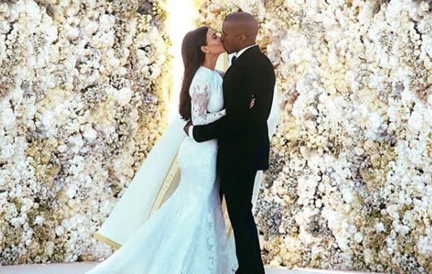 Seriously though, how epic would Kimye's wedding wall have been if these were doughnuts instead of flowers? Photo: Instagram/kimkardashian