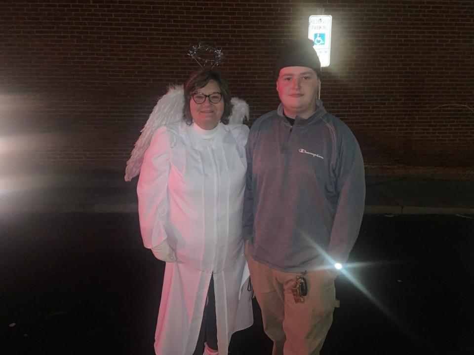 Peggy Roberts has participated in the Marshall Christmas Pageant for more than 20 years, including this year as the angel director. She's pictured here with her grandson, Colin Metcalf.