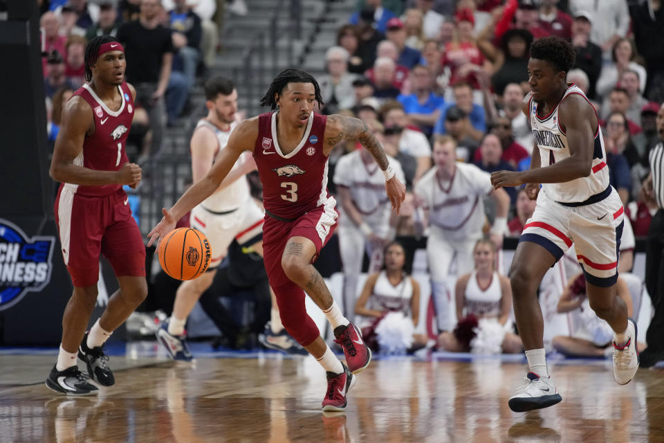 Arkansas' Nick Smith Jr. (3) dribbles down the court against UConn in the first half of a Sweet 16 college basketball game in the West Regional of the NCAA Tournament, Thursday, March 23, 2023, in Las Vegas. (AP Photo/John Locher)